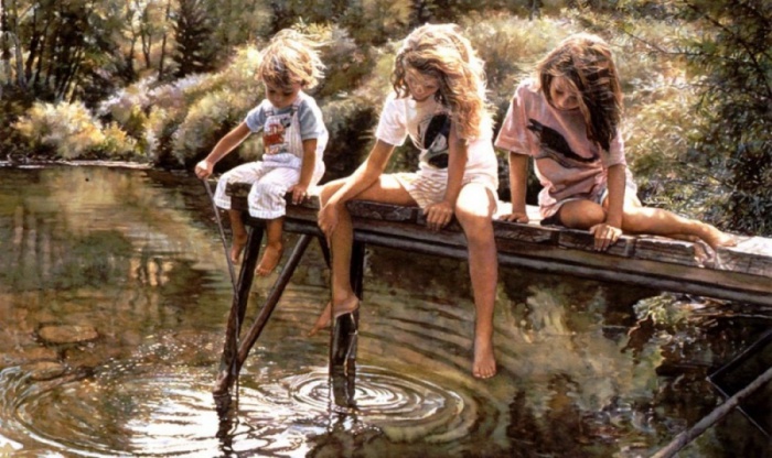 Дети, играющиеся на пруду с водой.