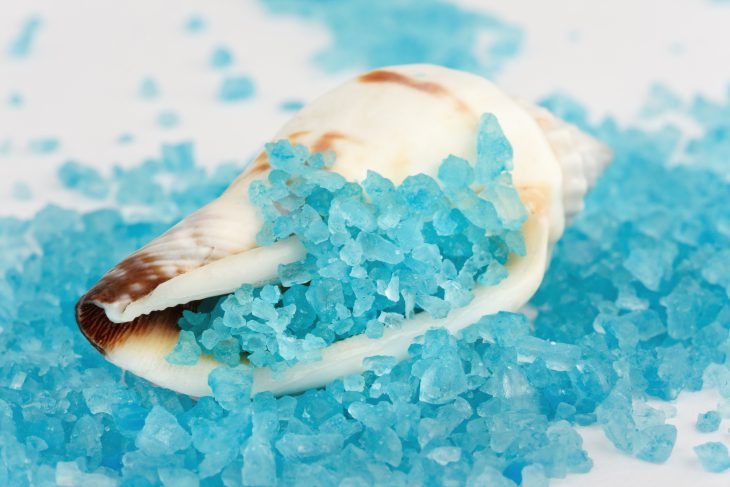 Sea shell with blue dead sea salt